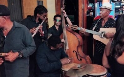 men playing music in a bar